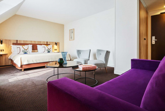 Hôtel Plaza Tour Eiffel - Junior Suite Canapé